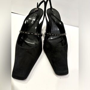 Black suede sling back heels.